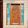 custom carved cabin entrance door