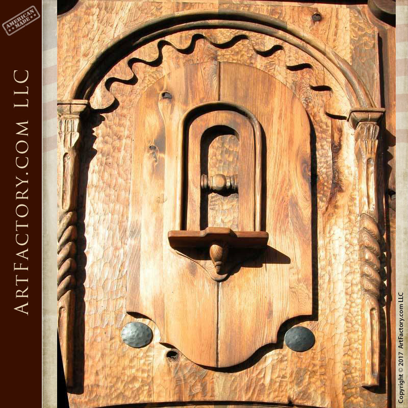 https://artfactory.com/wp-content/uploads/2010/02/custom-hand-carved-wood-door-4.jpg