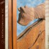 mountain lion carved front door