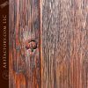 weathered raised grain wood double doors