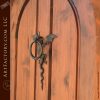 Arched Entry Door With Iron Dragon Knocker
