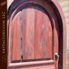 arched wooden panel door