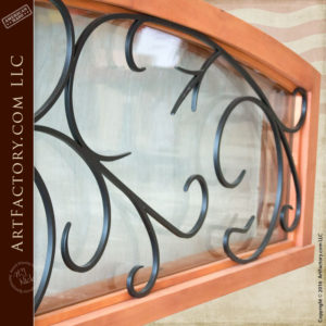 semi arched transom with French ironwork grill