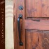 custom solid wood front door with elegant custom iron door pull