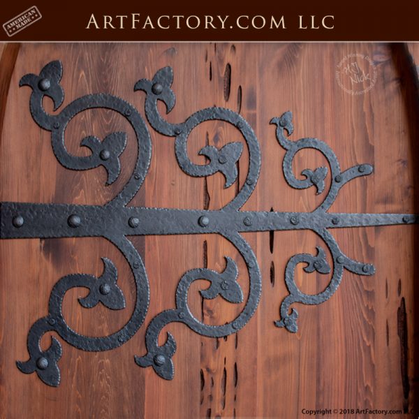 custom cathedral arched door with custom ornamental strap hinges