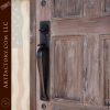 weathered wood arched door