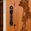 hand carved wine cellar door