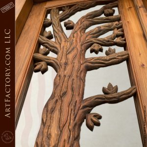 oak tree carving on door up close