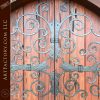 extravagant ornamental ironwork on wood door