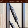 hand forged iron cattail close up