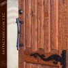 Custom Chiseled Door With Flowing Iron Straps