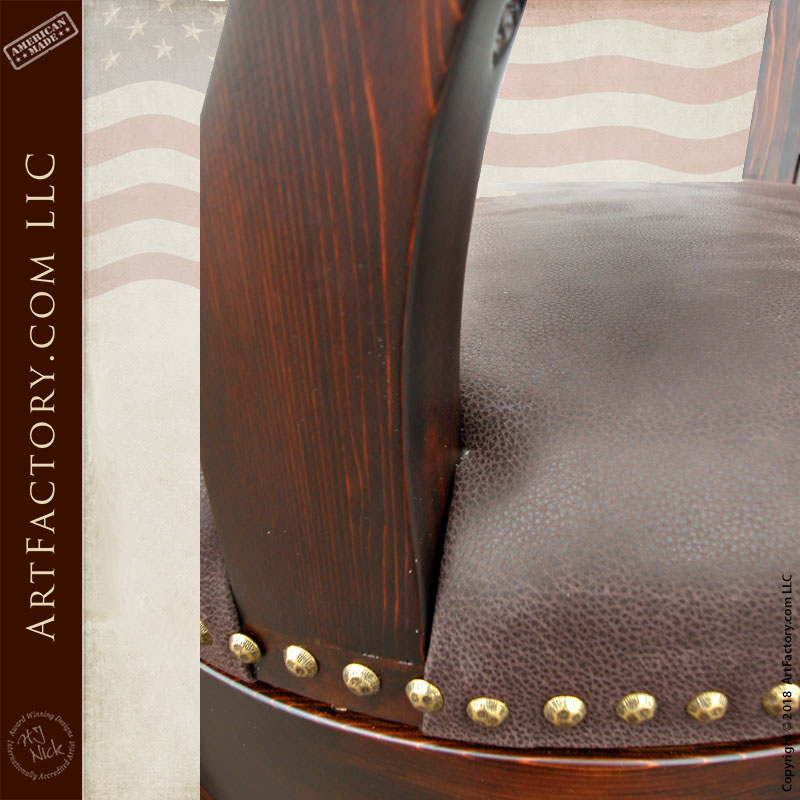 leather upholstery on custom bar stool up close