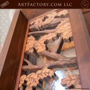 have carved oak leaves on sidelight glass