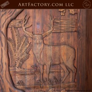 elk wood carving on door